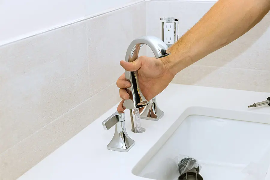 Installing a bathroom faucet fixture